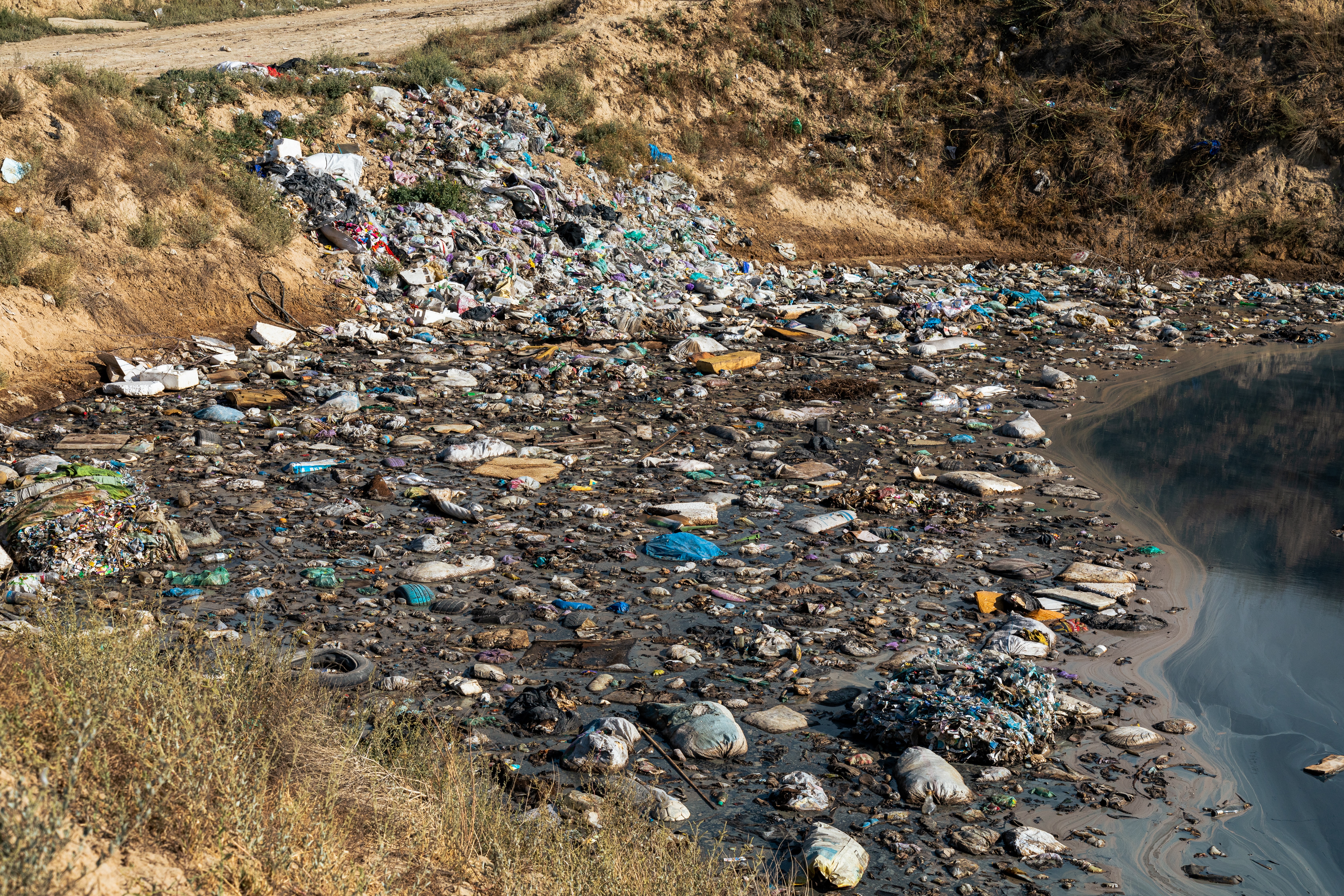An image outdoors containing landfill, garbage, pollution, and Gravel/rubble